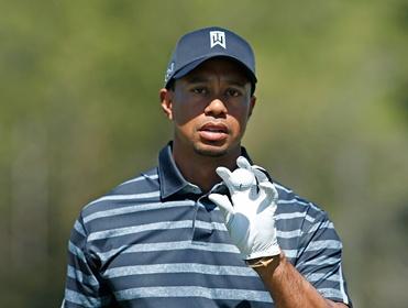 Tiger Woods - back in action after four months